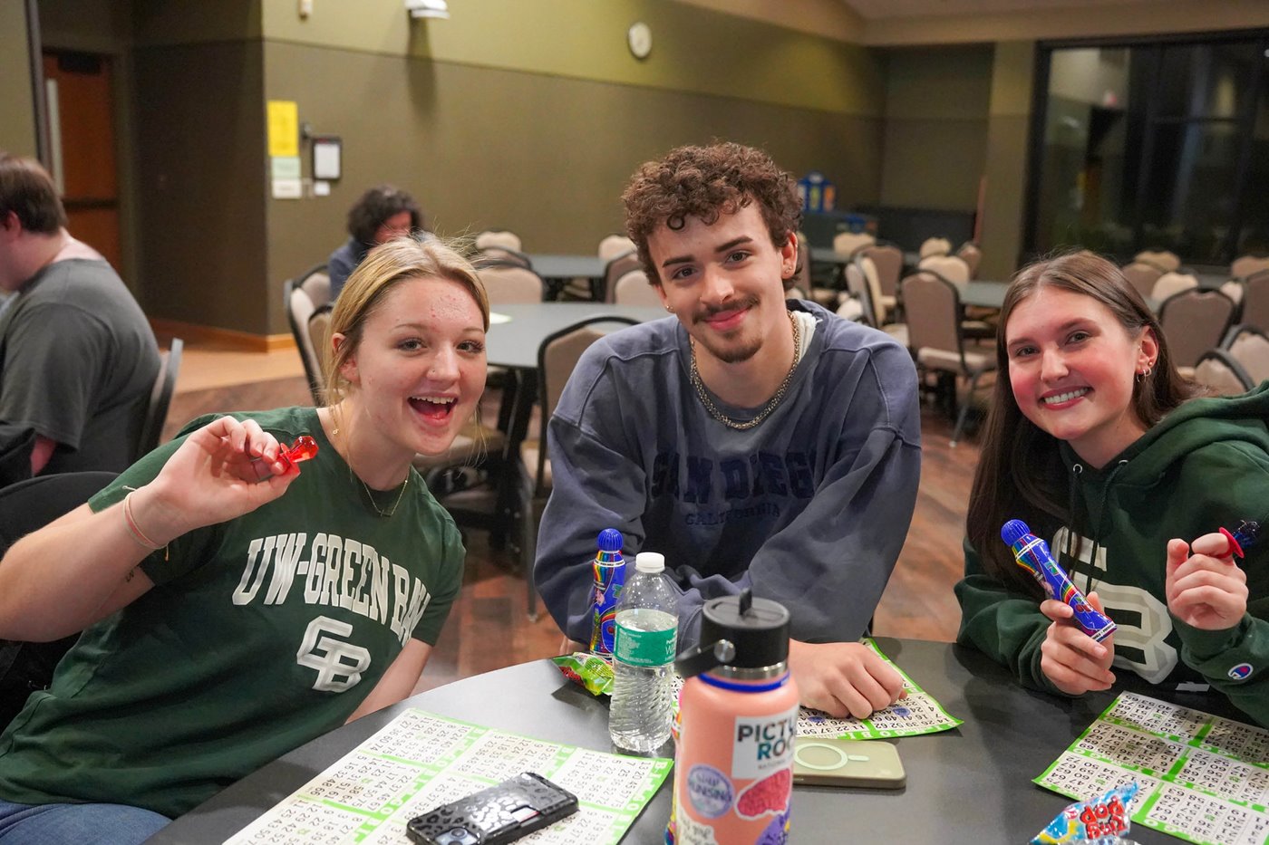 Three students playing Bingo