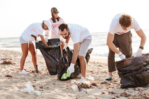 Group cleaning up beach