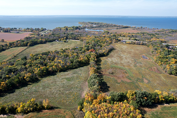 Drone view of the bay and grasslands