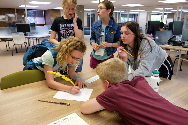 Group of campers drawing