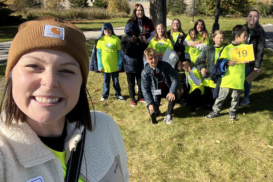 Mentor selfie with group of students