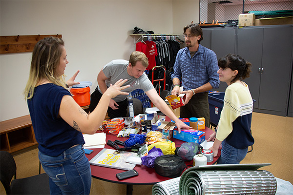 UREC Outdoor adventure leaders packign for a trip