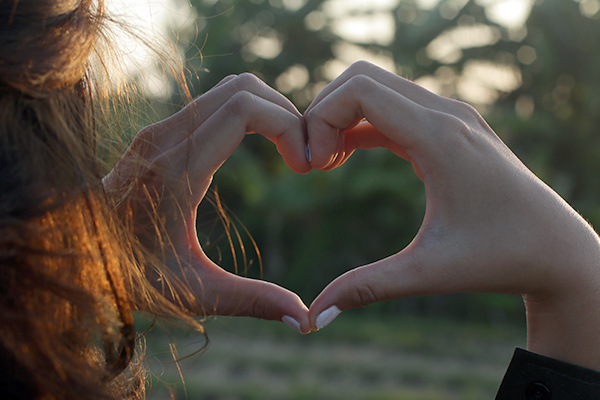 Hands creating a heart shape