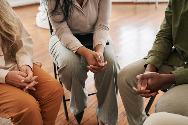 People sitting in therapy session