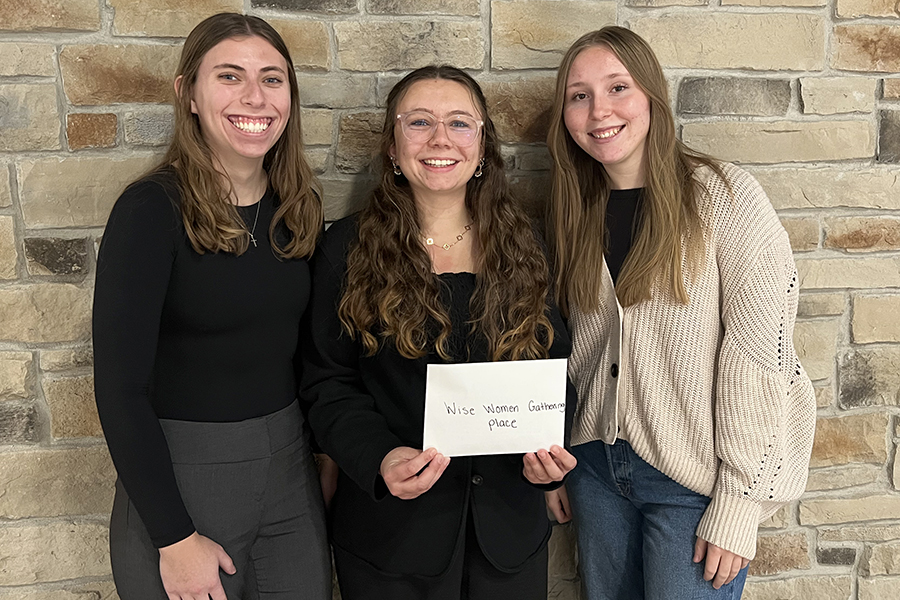 Smiling female Newman Fellowship students