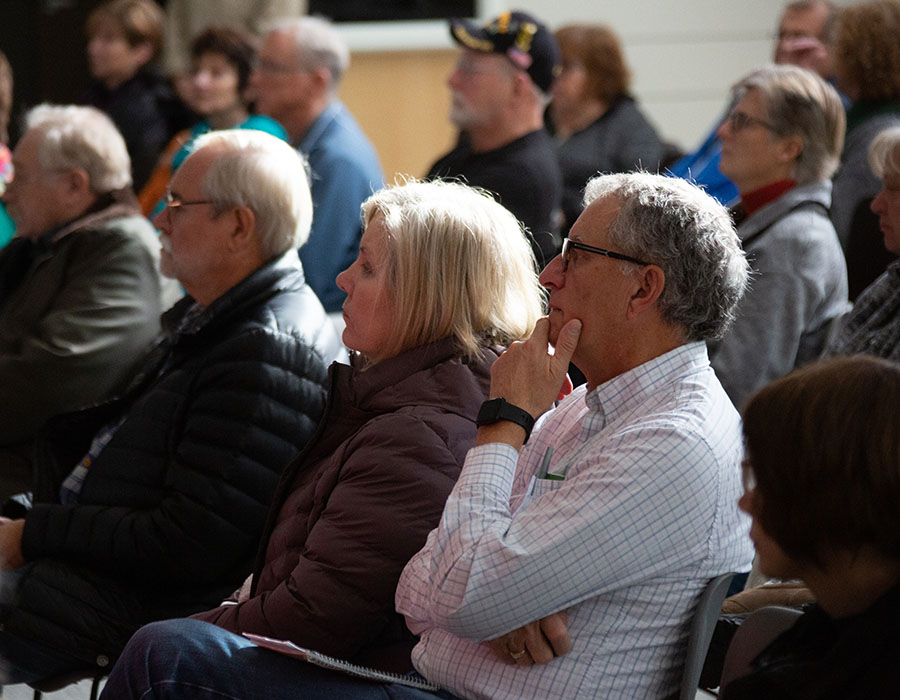 people listening during a class presentation