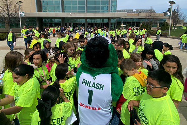 Phlash Mascot in group of students